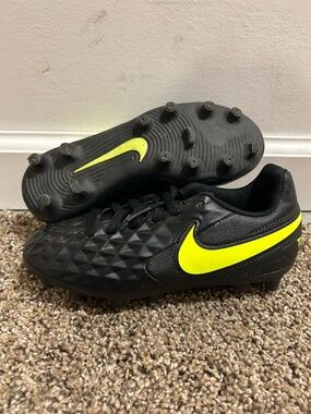Nike Black Soccer Cleats with Neon Yellow Swoosh